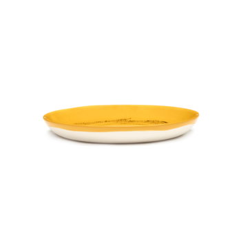 Yotam_Ottolenghi_FEAST_Ivo_Bisignano_B8921003J_Sunny_Yellow_Swirl_Dots_Black_plate_16_SERAX_.png