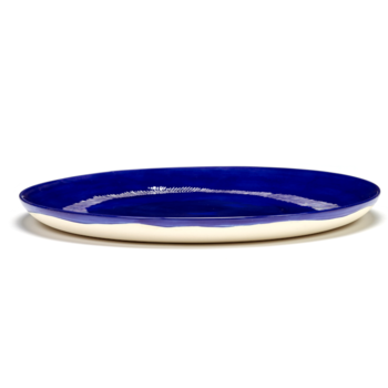 Yotam_Ottolenghi_FEAST_Ivo_Bisignano_B8921006A_Lapis_Lazuli_Swirl_Stripes_plate_L26_SERAX_.png