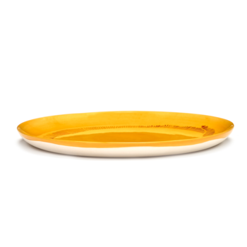 Yotam_Ottolenghi_FEAST_Ivo_Bisignano_B8921006E_Sunny_Yellow_Swirl_Stripes_plate_L26_SERAX_.png