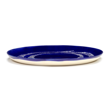 Yotam_Ottolenghi_FEAST_Ivo_Bisignano_B8921006I_Lapis_Lazuli_Swirl_Dots_plate_L26_SERAX_.png